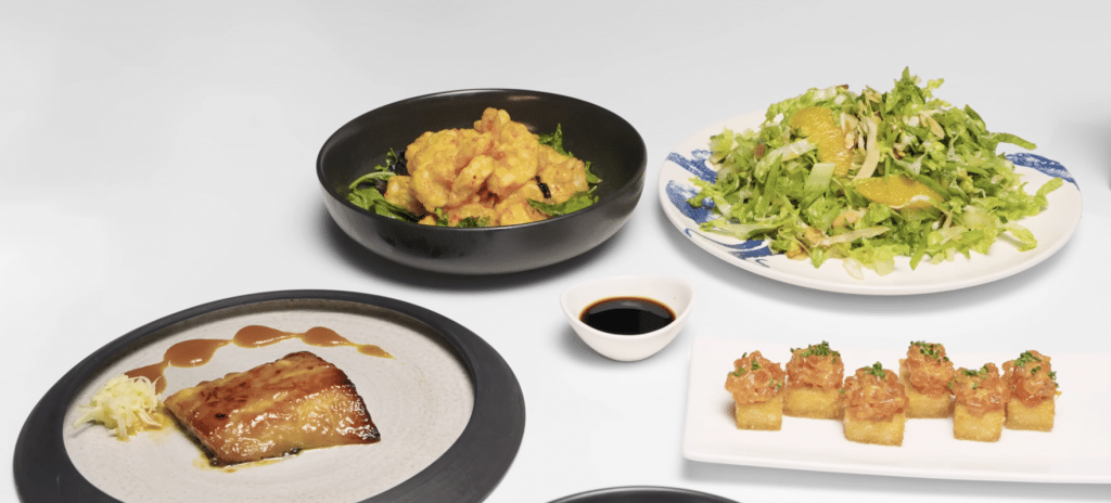 Rock shrimp tempura, miso roasted black cod, a salad, and crispy rice with spicy tuna from Nobu Las Vegas